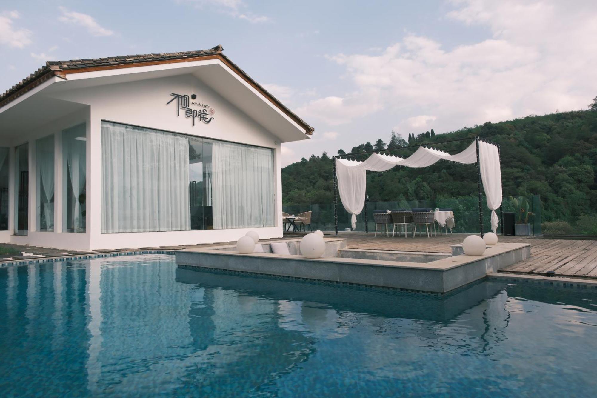 No Flowers Boutique Hostel คุนหมิง ภายนอก รูปภาพ
